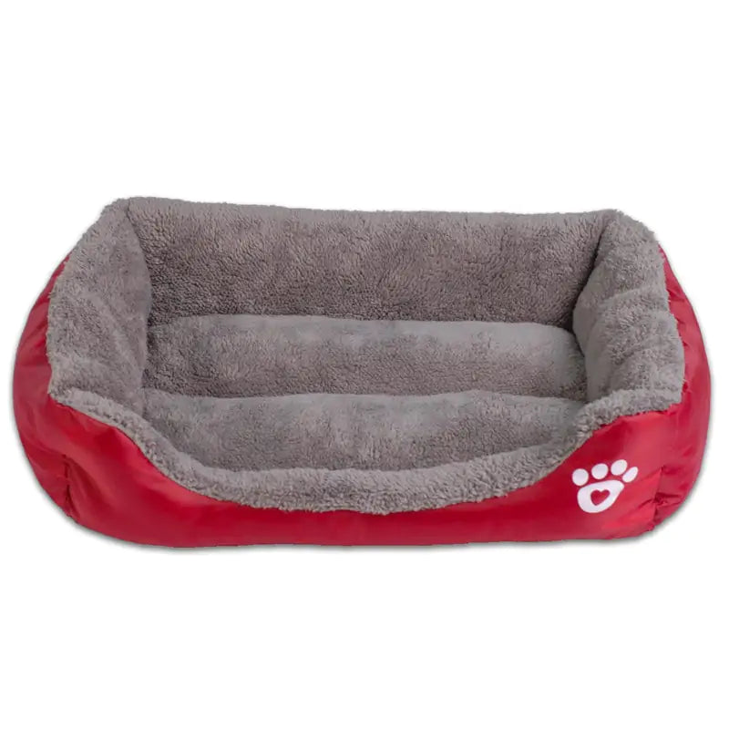 Gekleurd hondenbed in rood