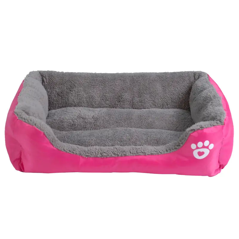 Gekleurd hondenbed in roze