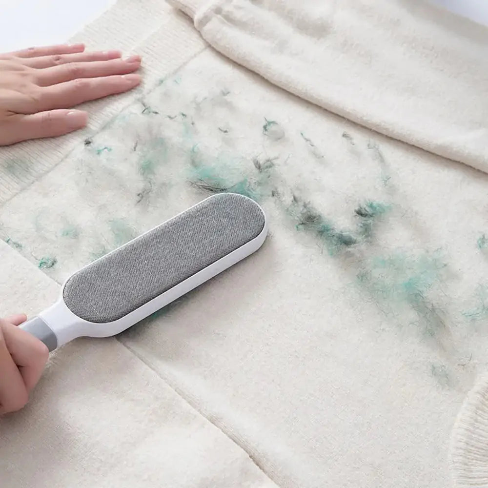 Pluizenborstel met pluizen